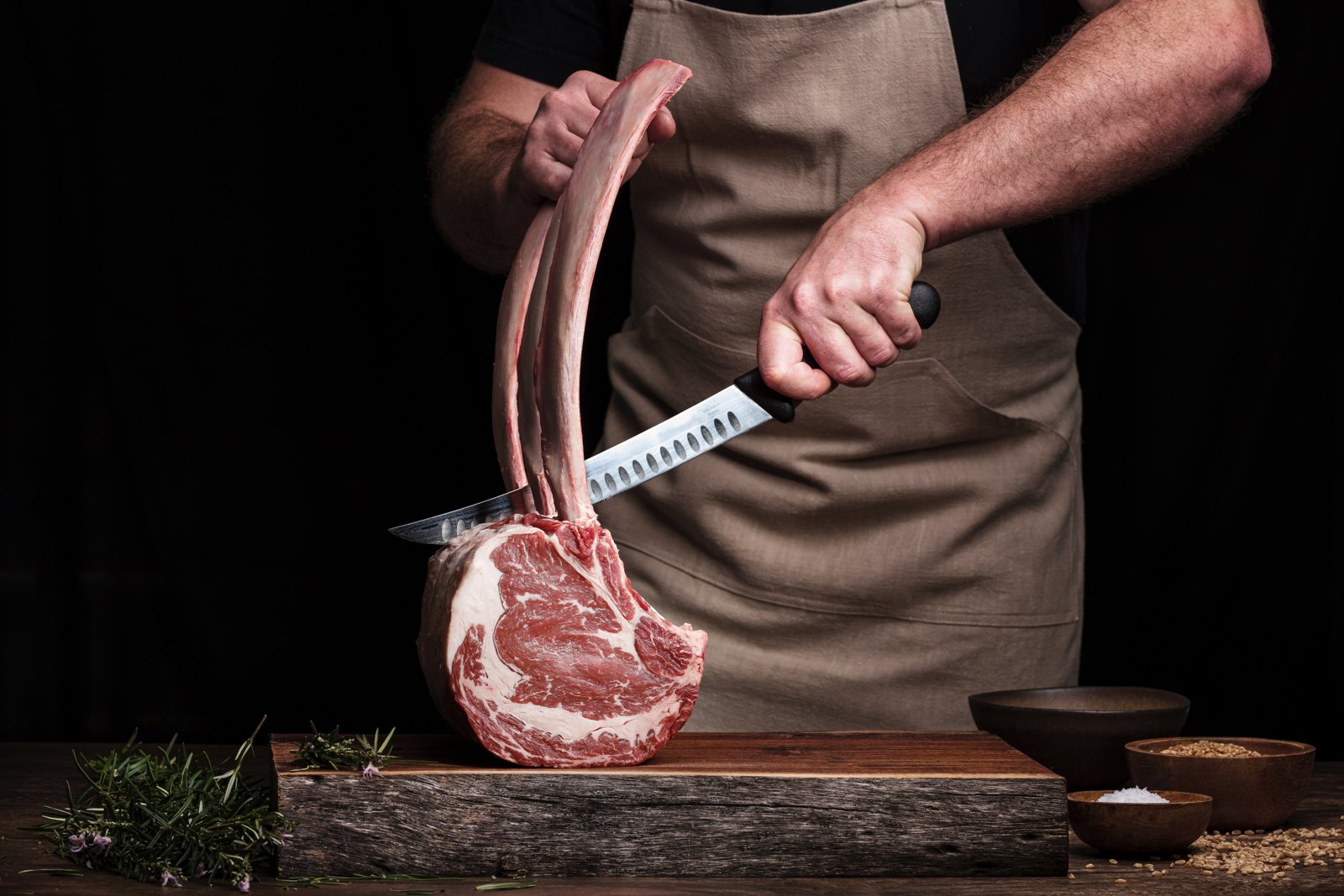 Craft butcher preparing a joint
